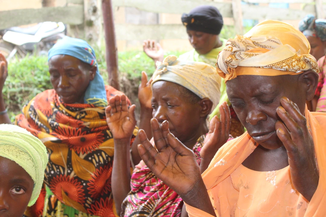 Batwa Praying